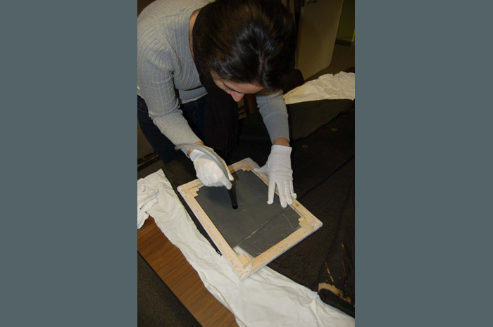 Humidity caused mold on Charles Dickens� coat, here being cleaned. 